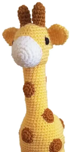 Crocheted yellow giraffe with brown spots, head and neck