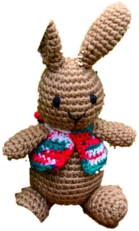 Brown crocheted rabbit in a red and teal vest